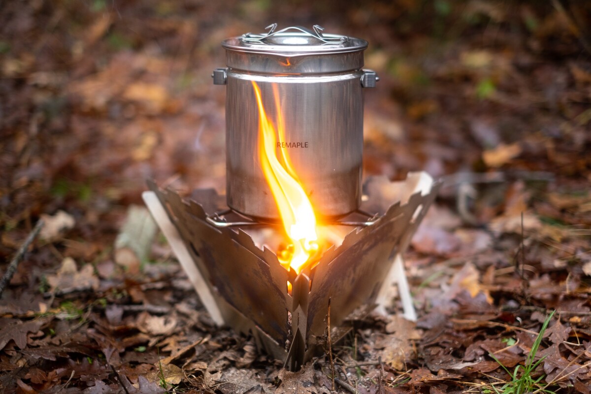 Collapsible gas canister fire pit is so small & light it hikes to camp