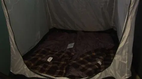 Two adults can sleep atop the floor mats