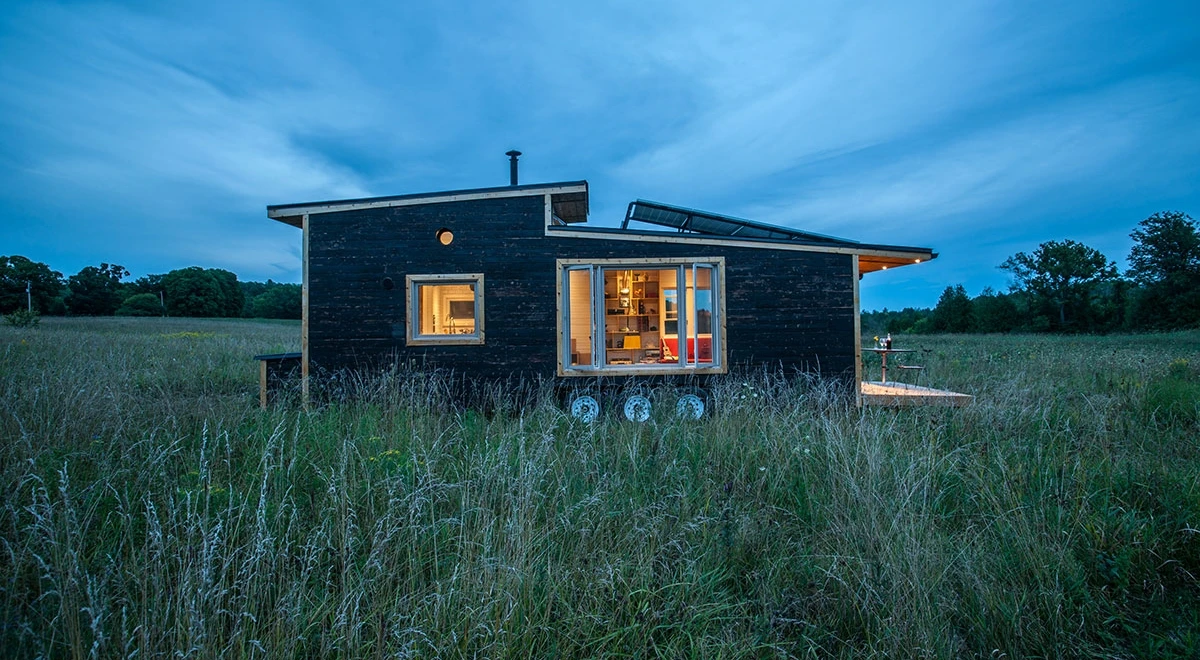 The Greenmoxie Tiny House is based on a triple-axle trailer