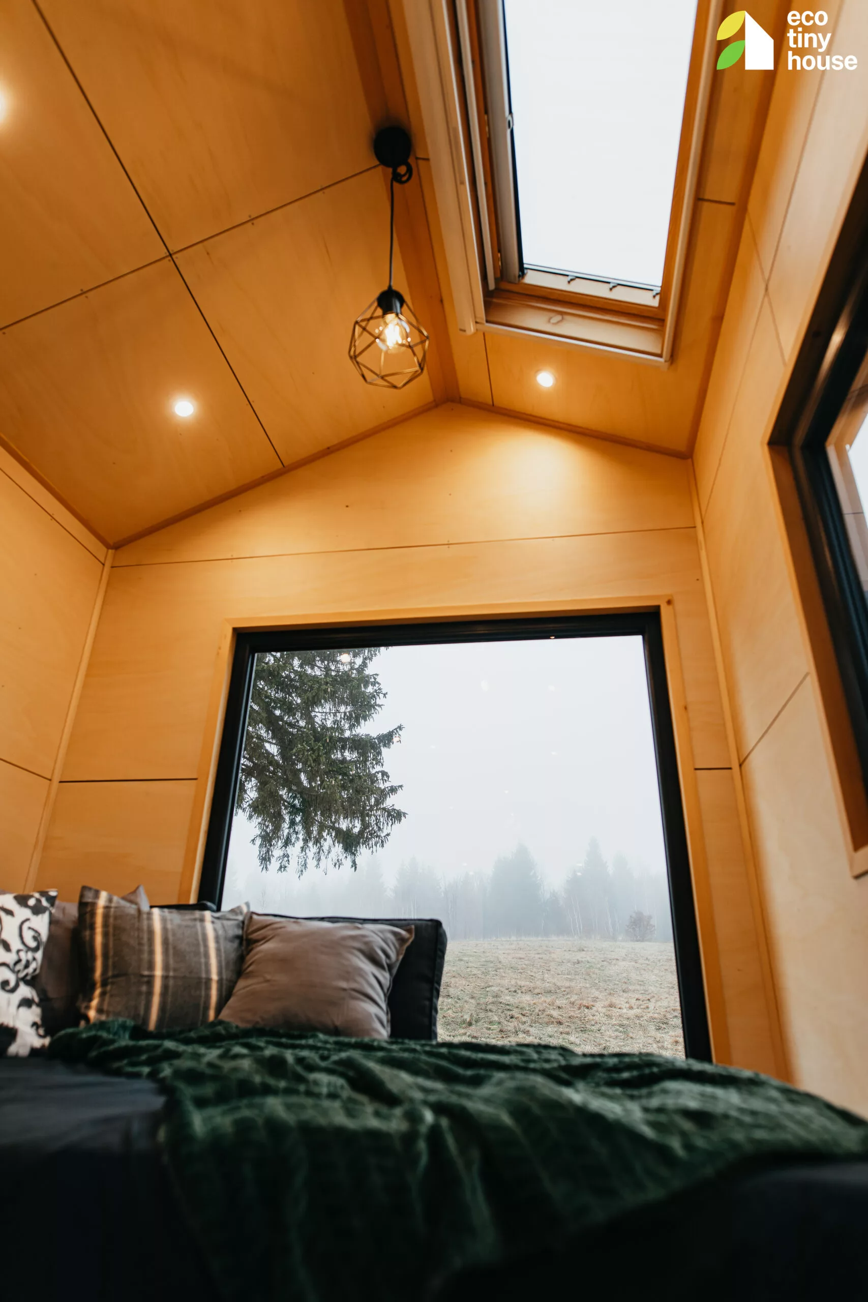 The Tiny Hogwarts' living area features a daybed that sleeps two and is topped by a skylight