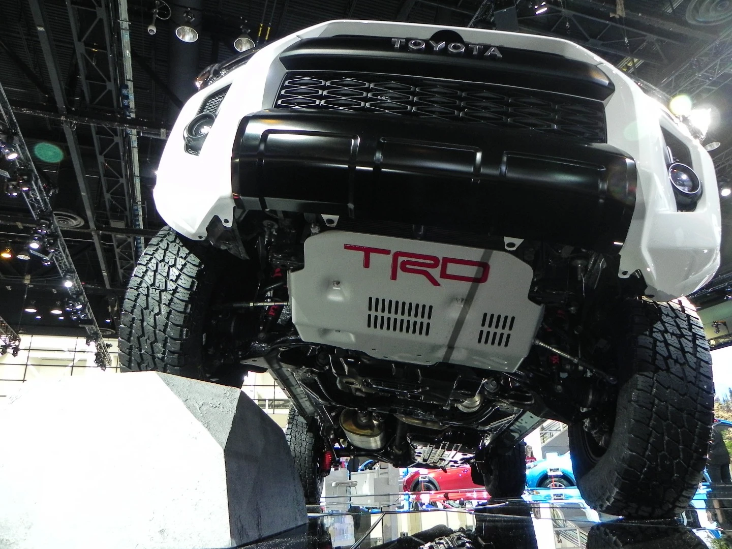 Underneath the Toyota 4Runner TRD Pro, the heavy-duty skid plate dominates and nearly hides the unique KDSS sway bar disconnect system