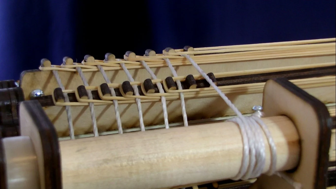The RBmG takes 64 rubber bands, though with care, XYZBot says it can be double loaded with 128