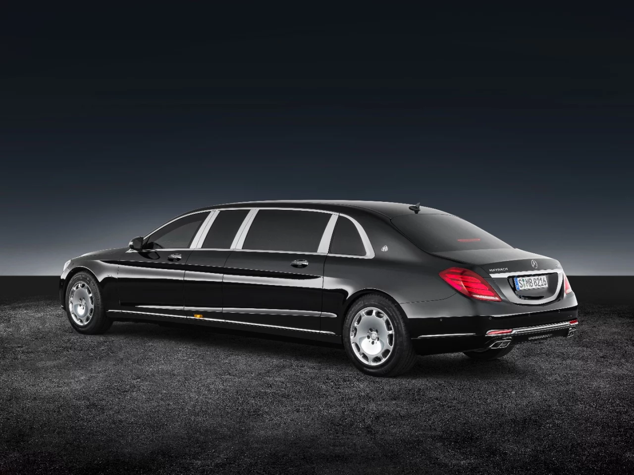 The heavy rear doors open by way of a power-assist system