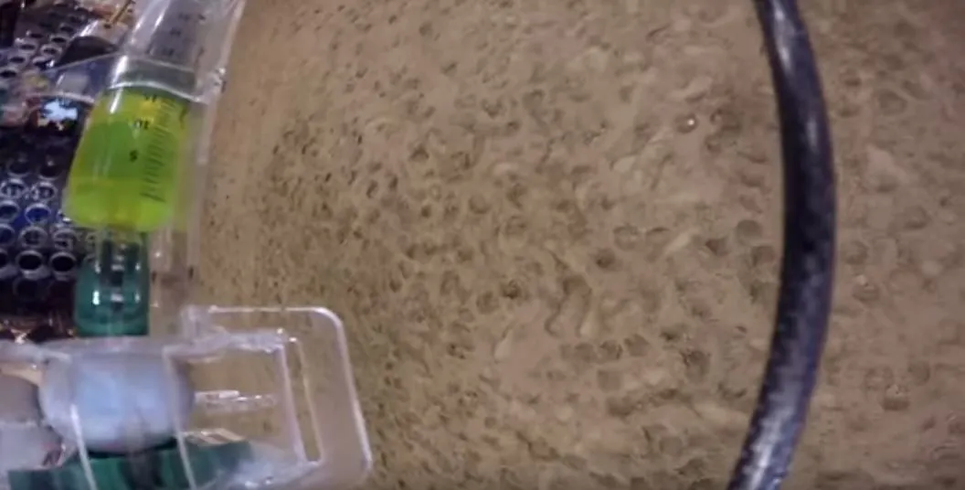 Balls of chemical powder are injected with alcohol to start a reaction