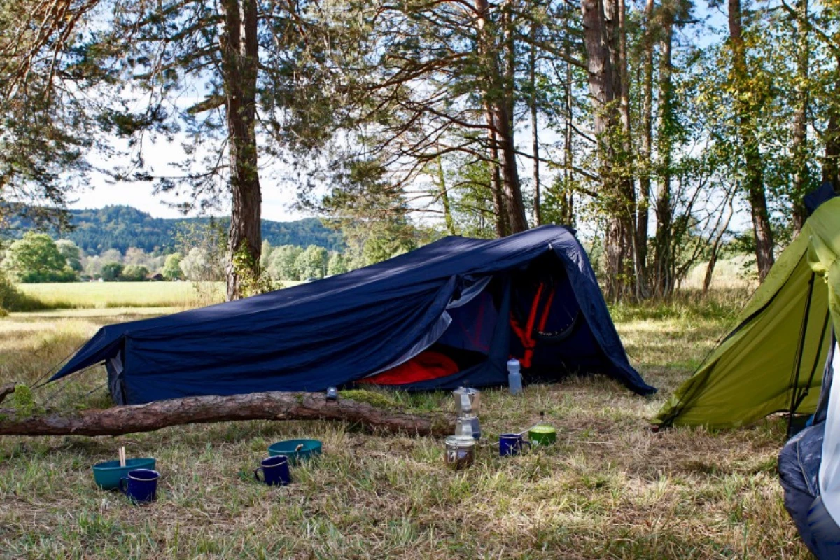 The Moruta Hogar 2P tent, with a roof-supporting bike separating the sleeping quarters from a storage area