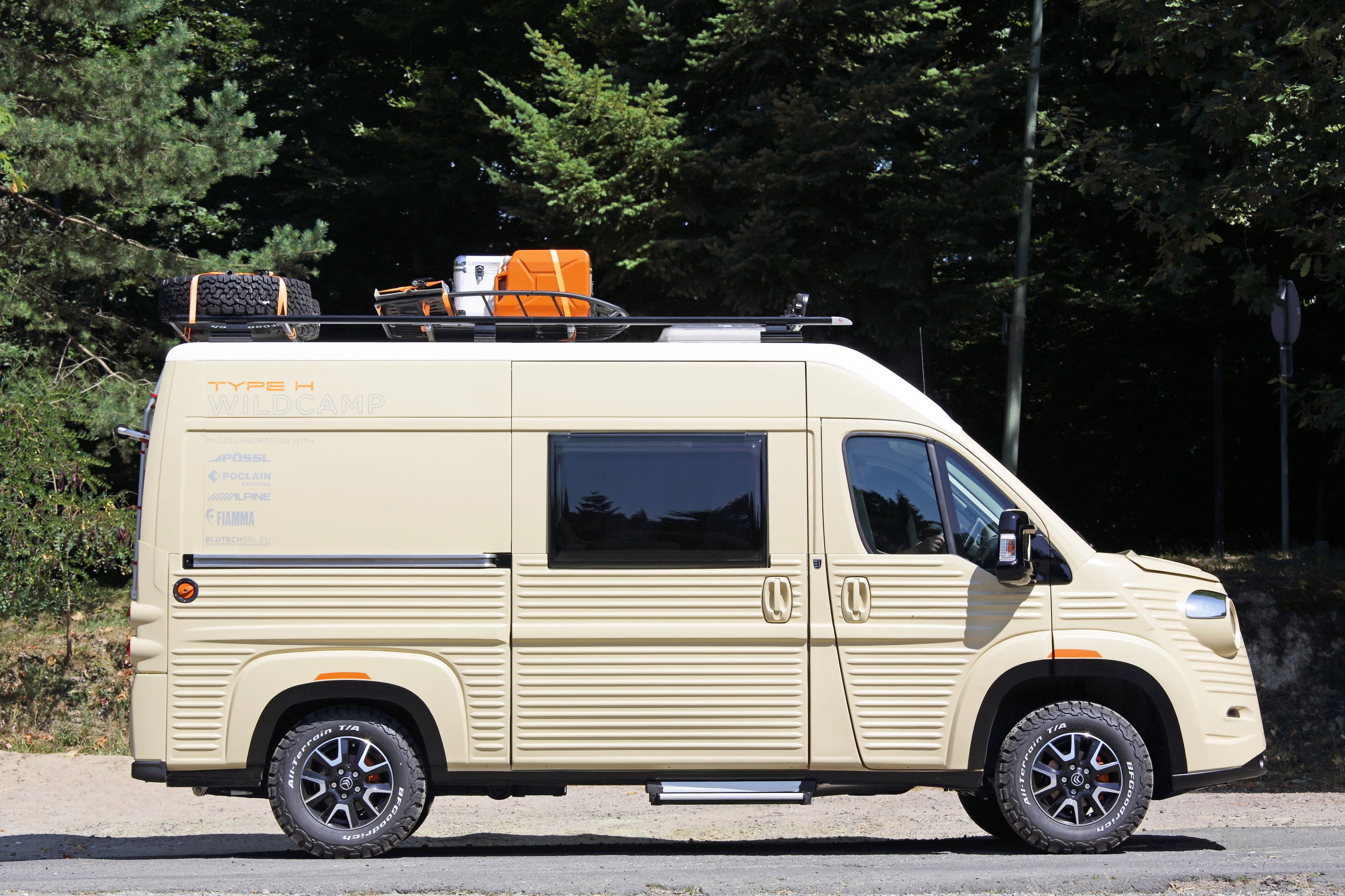 The loaded roof rack gives the Type H WildCamp a "ready to hit the highway" look