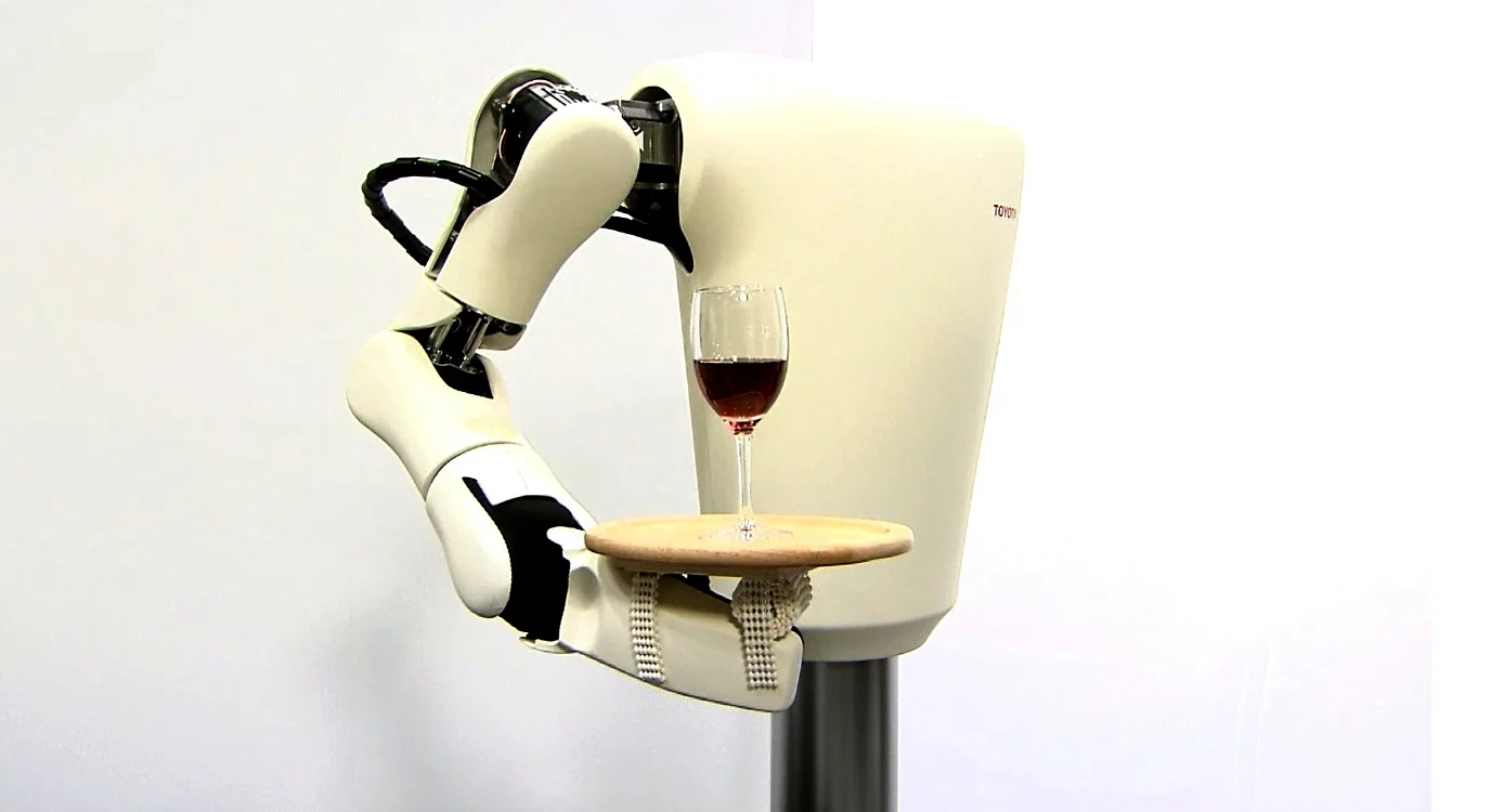 Toyota's torque servo robot arm balances a wine glass