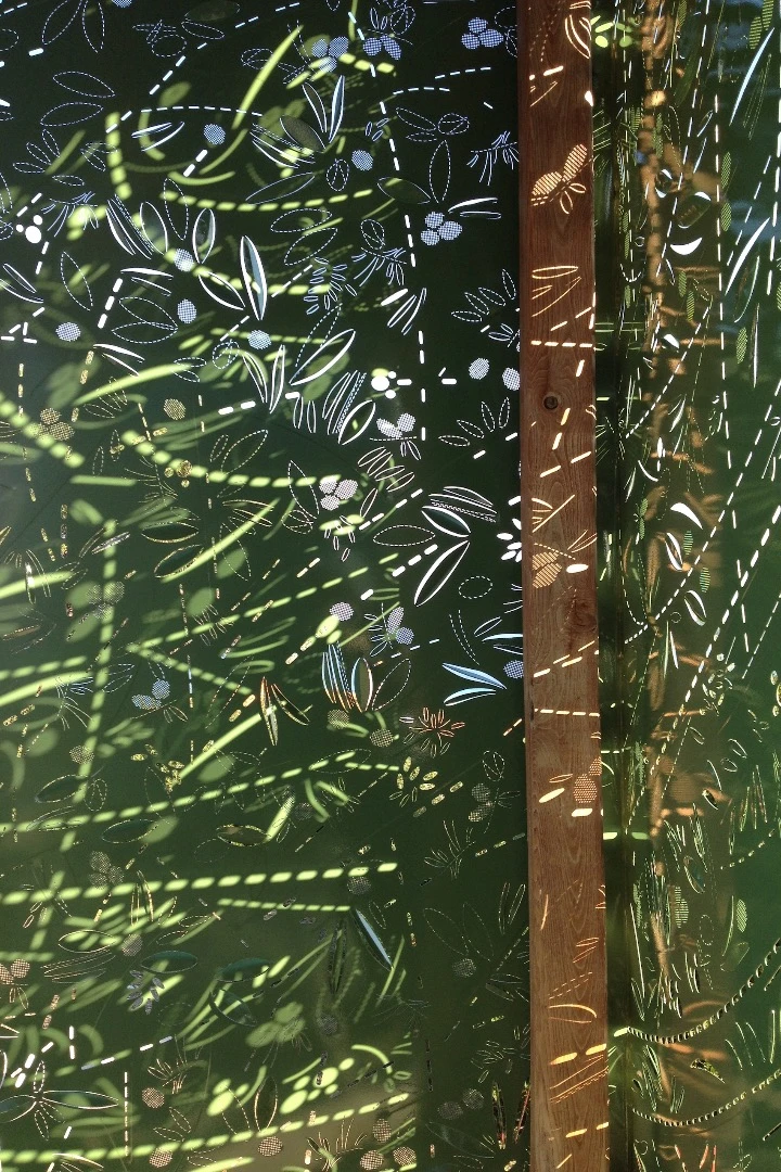 The Olive Tree House's decorative walls, seen close up