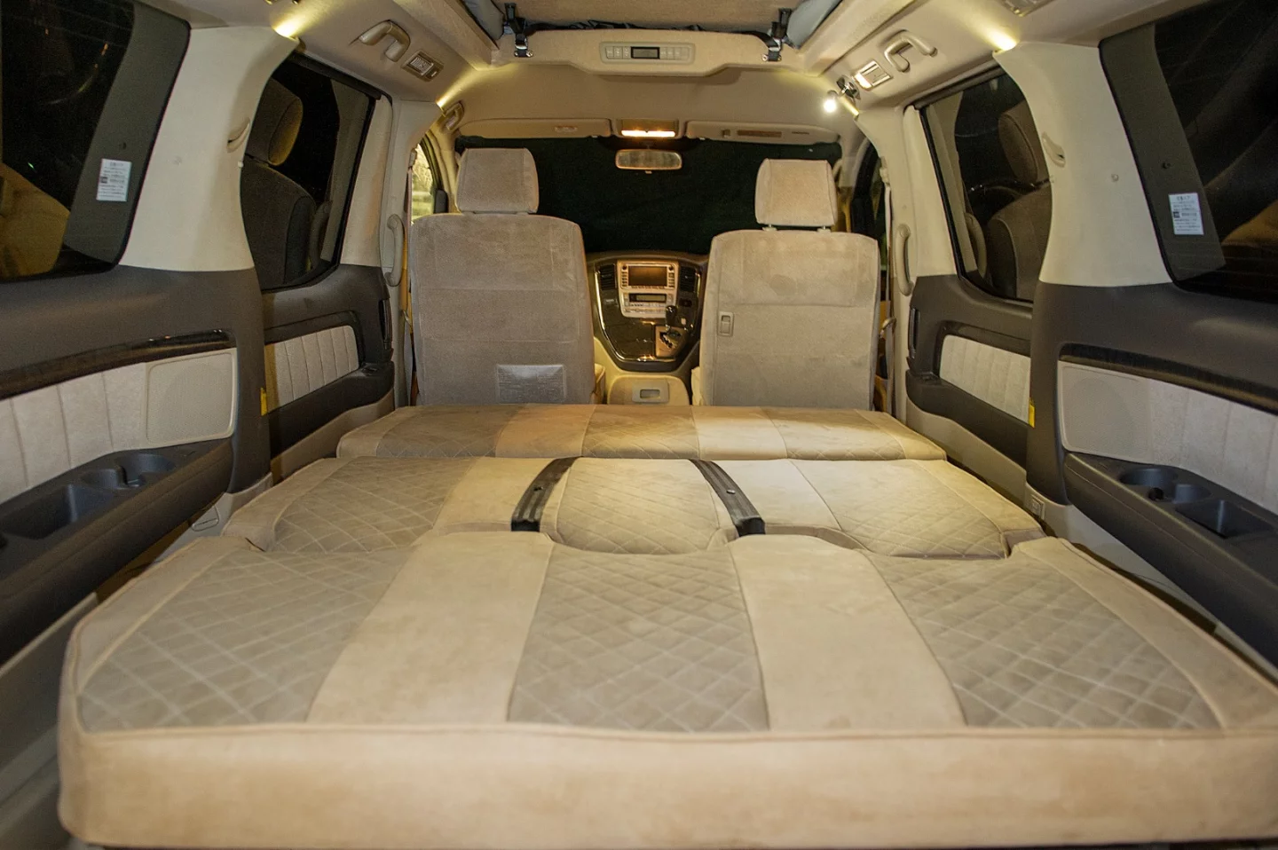 Without a kitchen block to the side, the Eco Explorer bed fills out the width of the van cabin