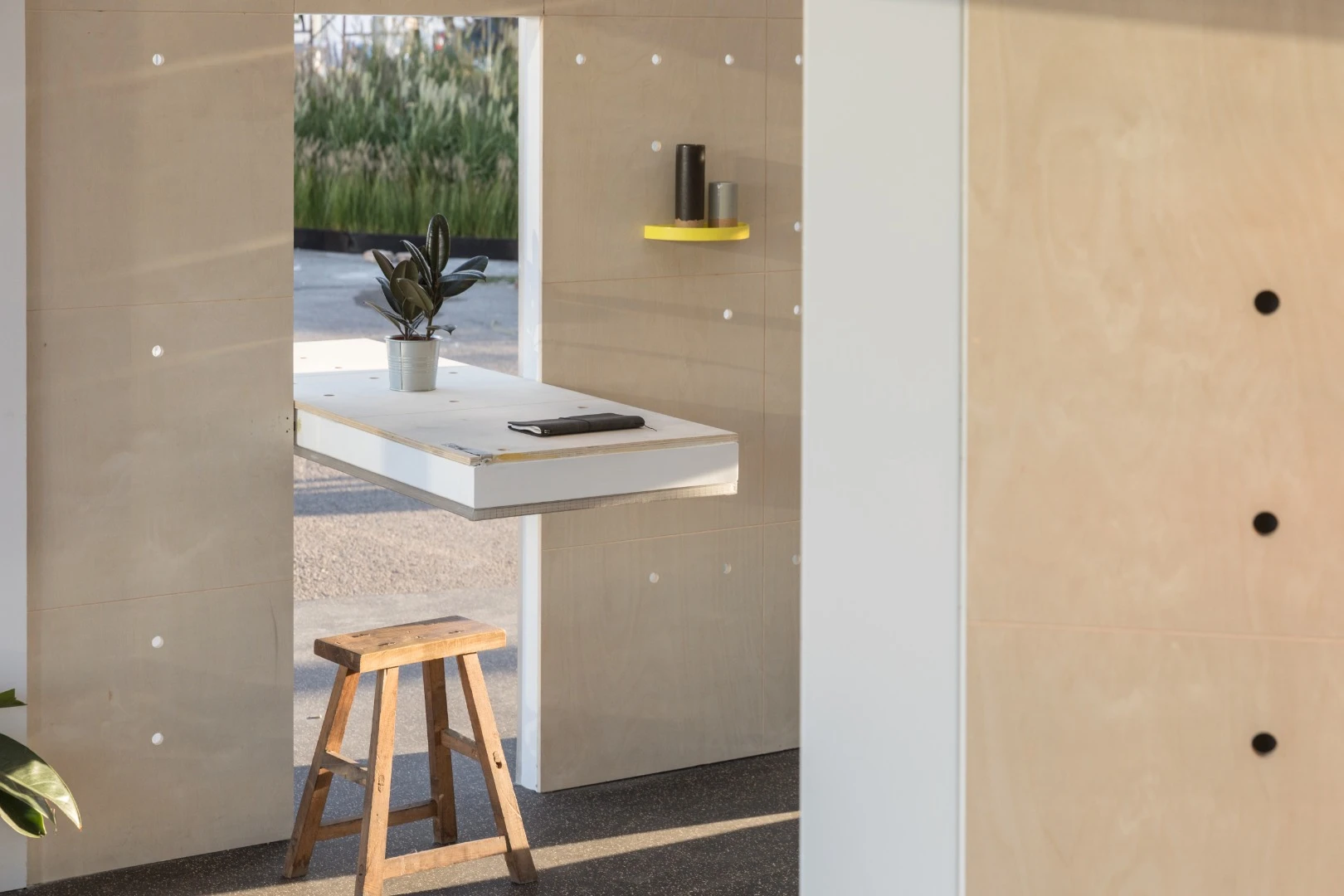 The Mini Living Urban Cabin Beijing features some of the same design elements seen on Mini’s Urban Cabin concept for LA, with rotating wall panels that swing up or around to create shelves and open interiors up to the outside
