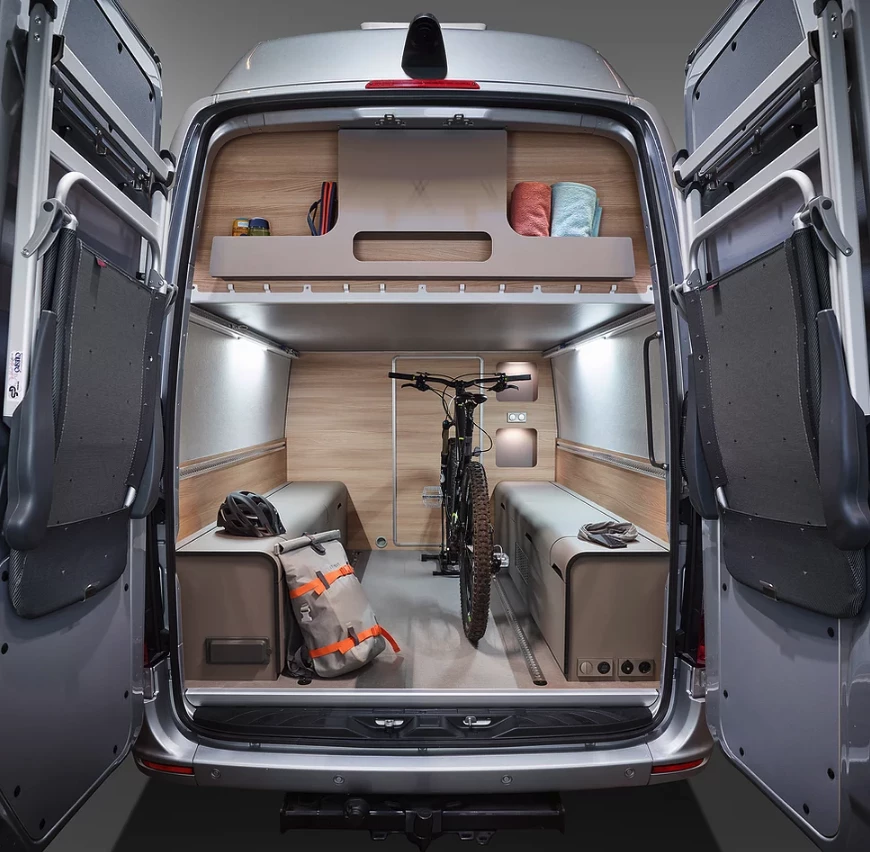 Alphavan's traditional FlexPort carries gear on the ride and doubles as a rear bedroom for children