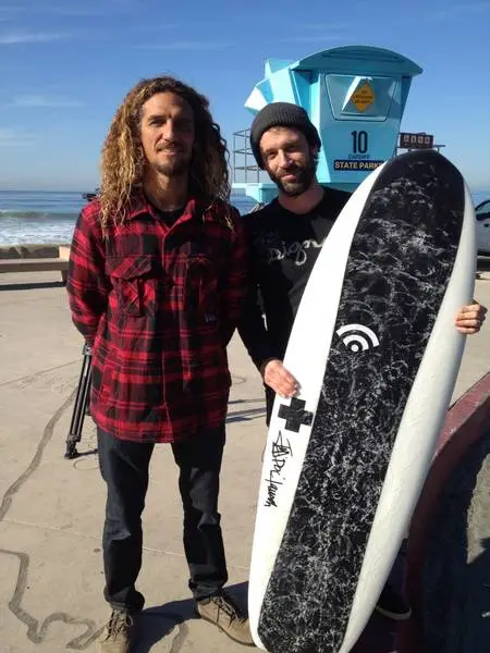 Machado and Lee prepare to see how the board performs