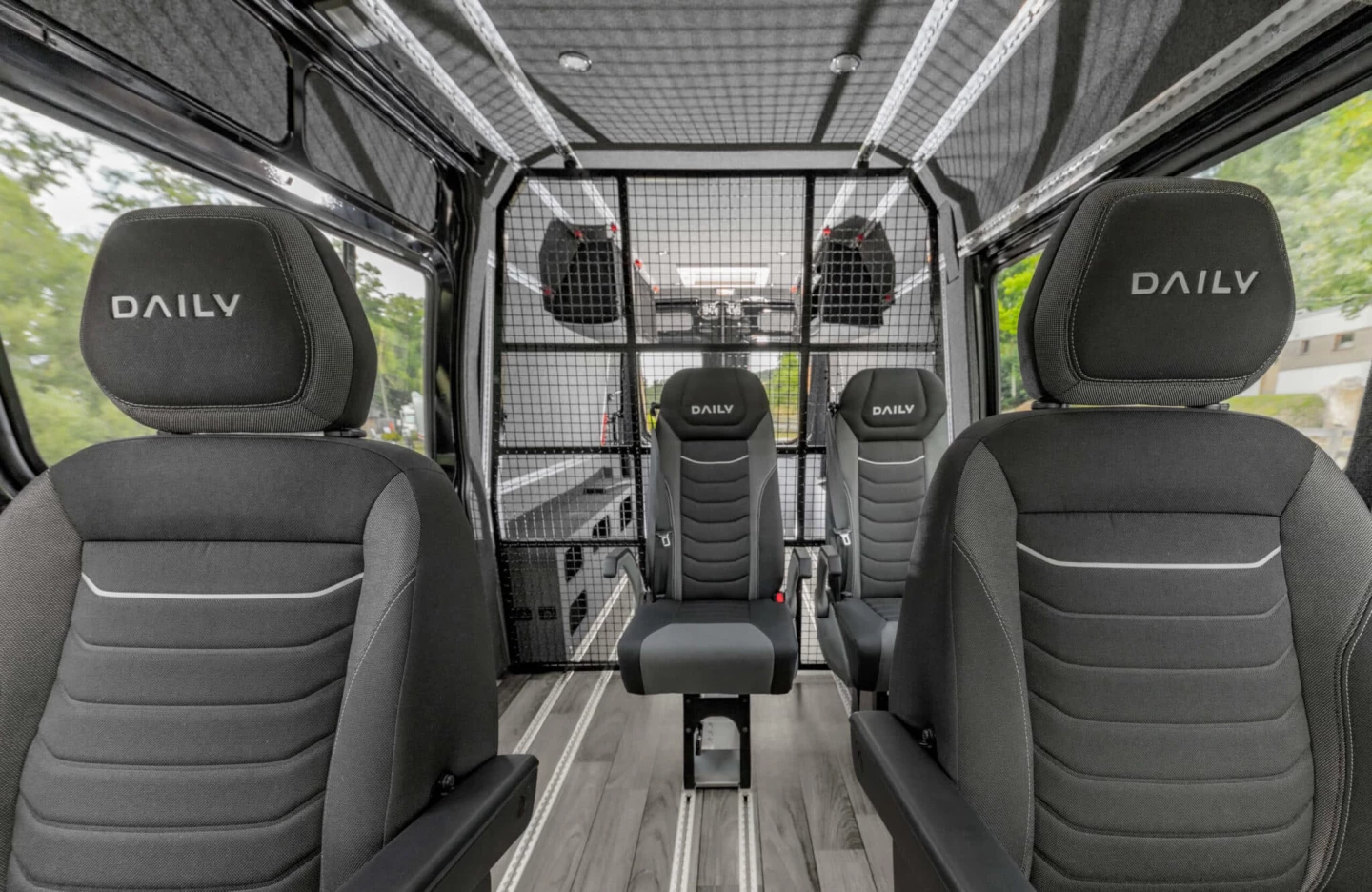 The partition/bed keeps the passenger and load areas separate