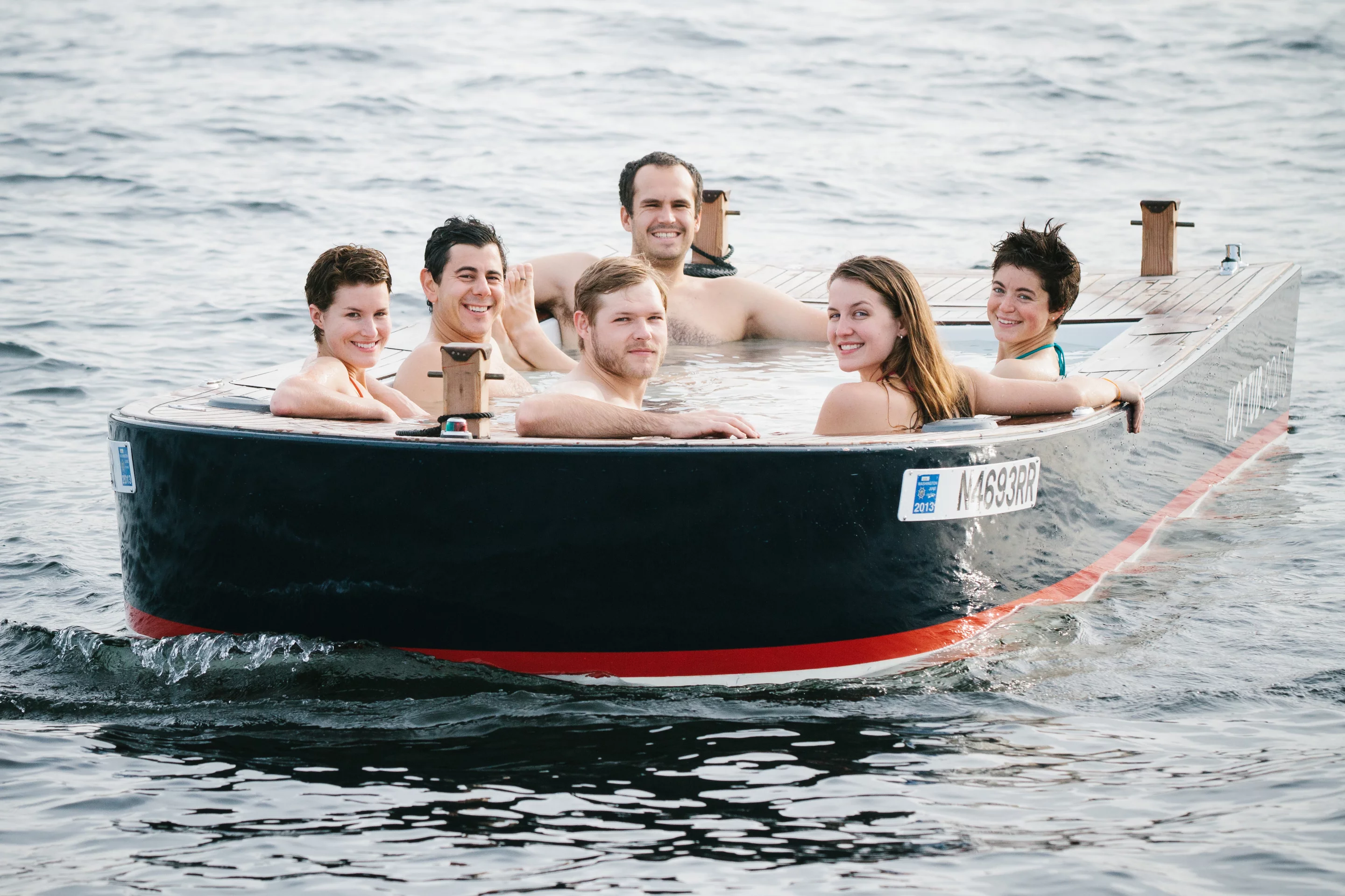 The Hot Tub Boat allows its passengers to soak while they cruise