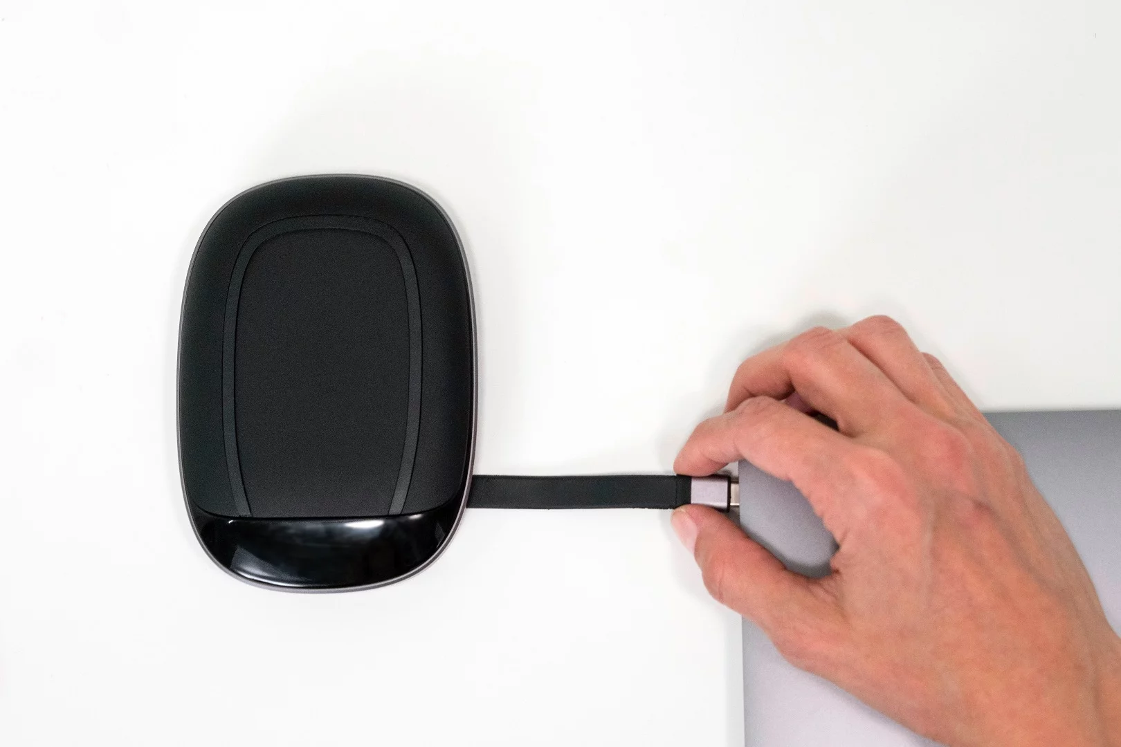 The USB-C cord is retractable