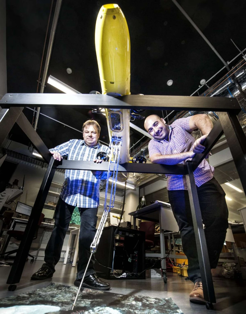 Developers of the COTSbot, Drs Matthew Dunbabin (left) and Feras Dayoub (right)