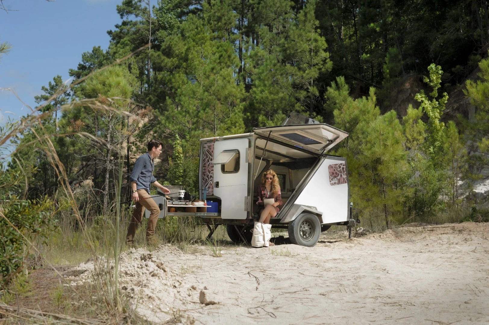 The simple TigerMoth interior includes a couch/bed and table