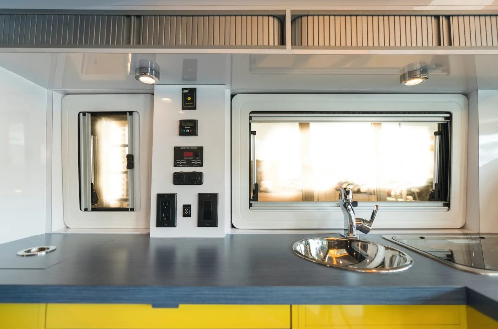 The Imagine has a more well-equipped kitchen with larger fridge and microwave