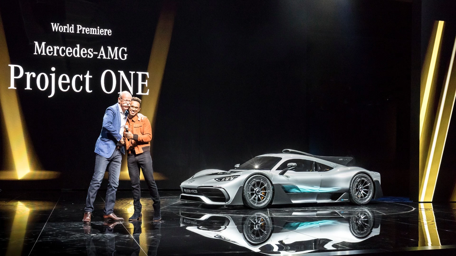 Dr. Dieter Zetsche, Chairman of Daimler AG and Head of Mercedes-Benz Cars, and the three-time world champion of the Formula 1, Lewis Hamilton, present the show car Mercedes-AMG Project ONE during the eve of the IAA.