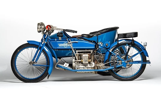 Produced from 1911 to 1917, when it became part of the Schwinn empire, the two-speed Model D long-wheelbase (65 inch) 1915 Henderson Four cost $335 and although Henderson offered a sidecar option at the time, the motorcycle on offer here is a Rogers item. Other features of note on this machine include an aftermarket passenger saddle, full acetylene lighting set, and a Klaxon horn. This 1915 Henderson Model D With Rogers Sidecar (Lot S80) is estimated to fetch between $250,000 and $300,000