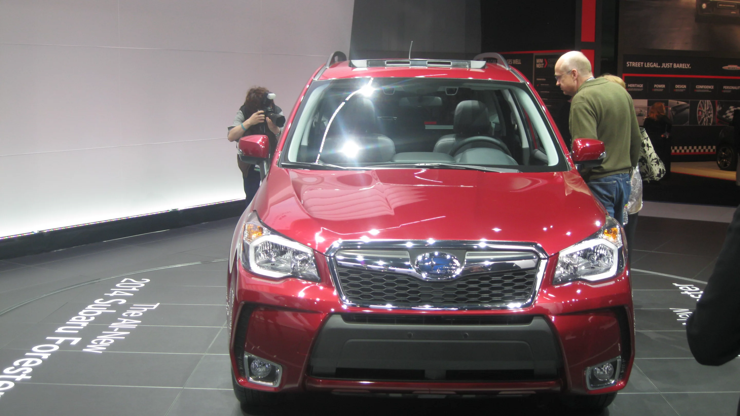 The 2014 Forester's front-end gets redesigned with "hawkeye" headlights and a new grille