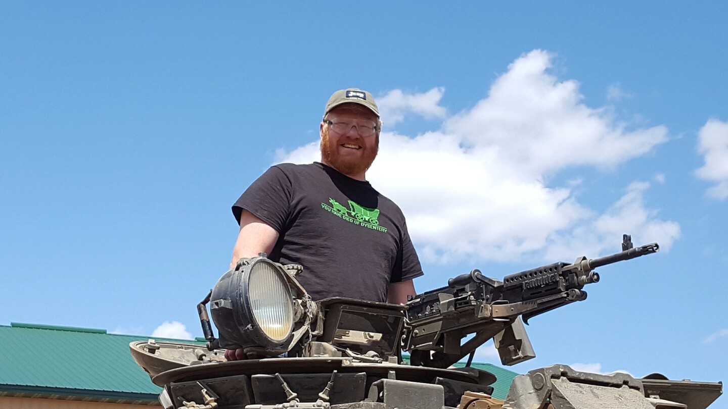 The author looking smug atop a Chieftain FV4201