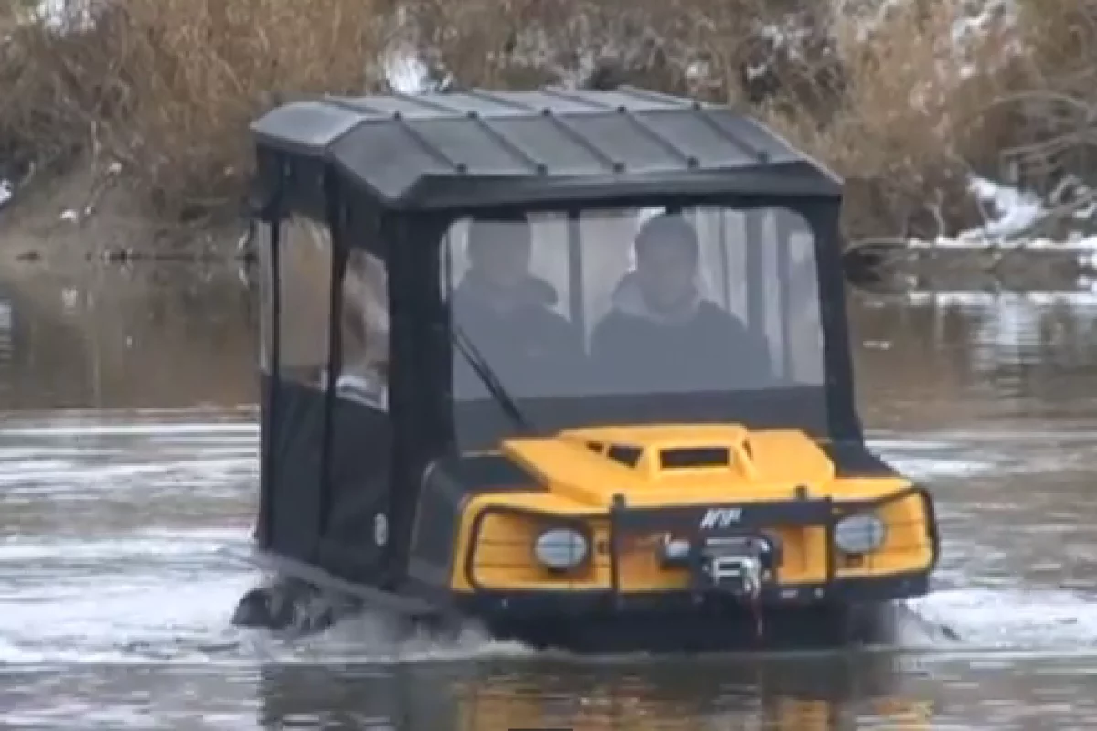An ARGO XTI with available canopy shows off its water skills