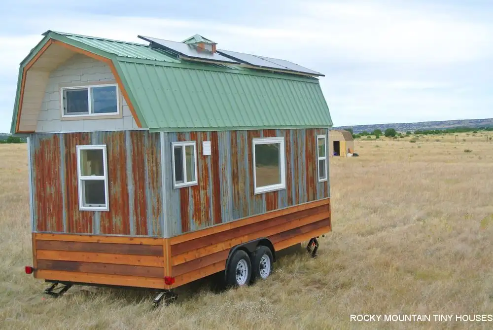 The Bitterroot Valley is clad in reclaimed materials and off-cuts, including rough cut lap cedar, rusty reclaimed corrugated metal, and cedar shakes