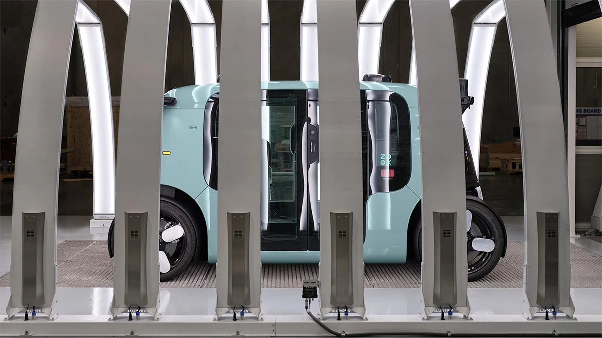 One bit of end-of-line testing involves passing the vehicle through a light tunnel to check for scratches, panel gaps, and other assembly issues