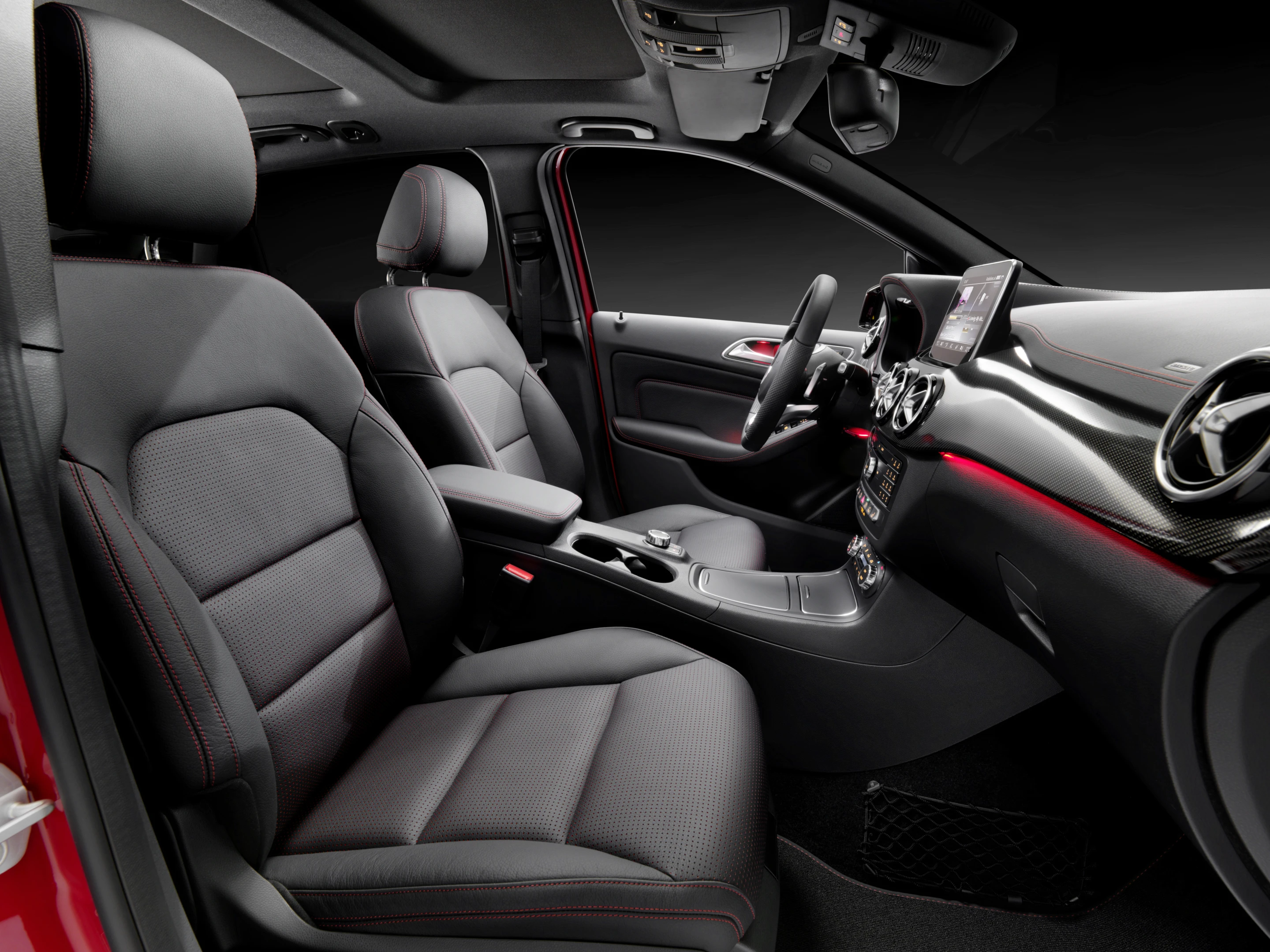 A larger, 8-inch COMAND screen sits atop the dash
