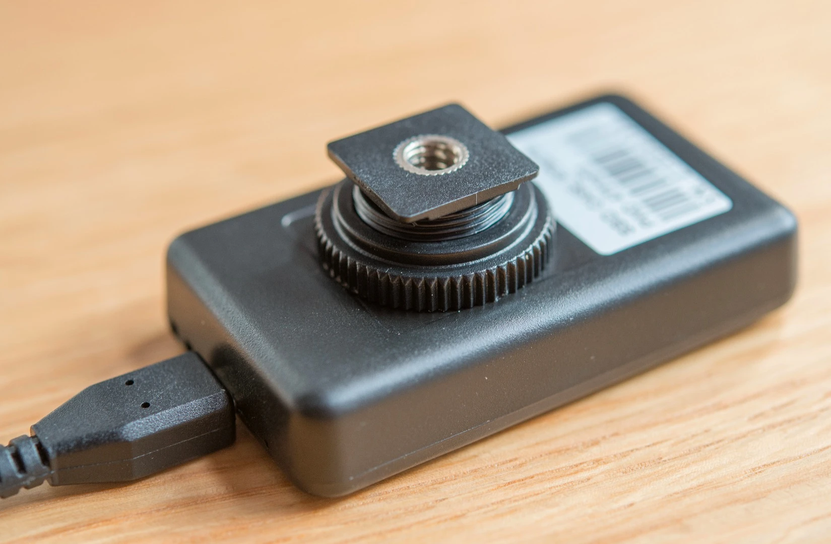 The Case Remote Air from Cheering Tech can be mounting on your camera's hot-shoe, or elsewhere using the tripod thread