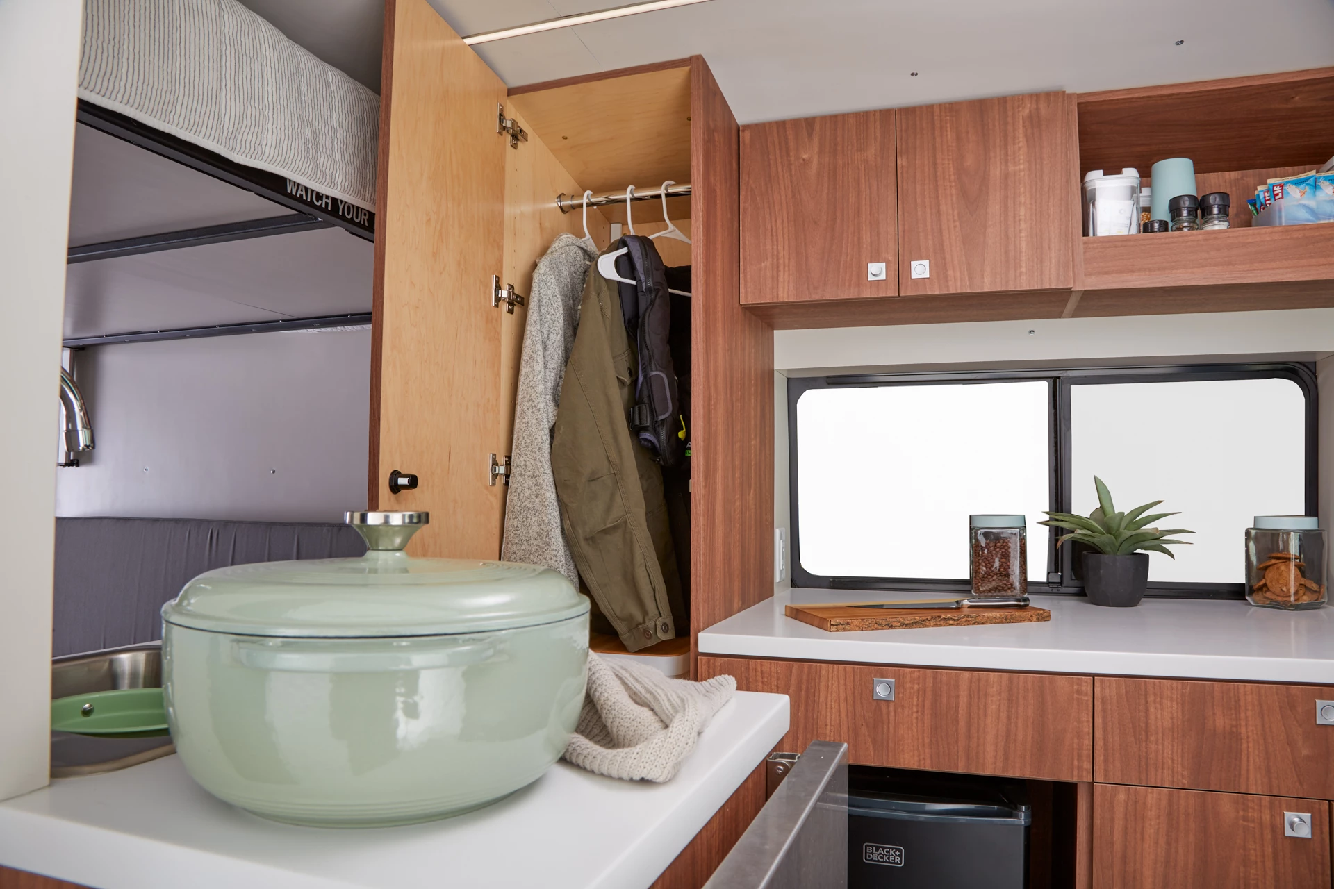 The wardrobe closet offers space for jackets and clothes