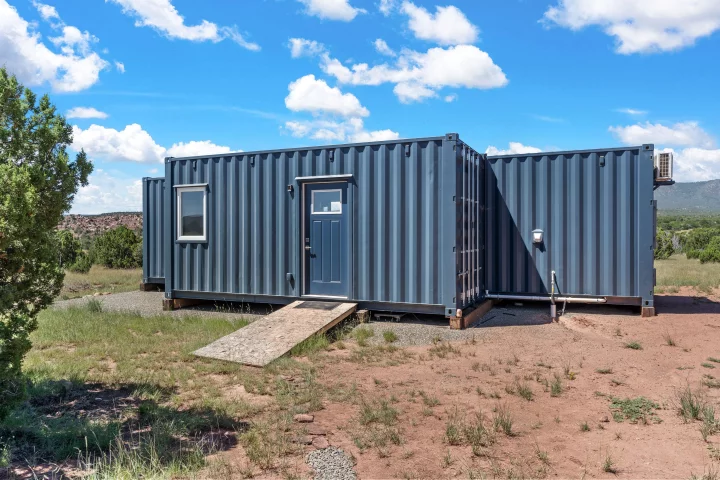 The Luke tiny house has been built from two shipping containers and offers a surprisingly spacious interior for up to two people