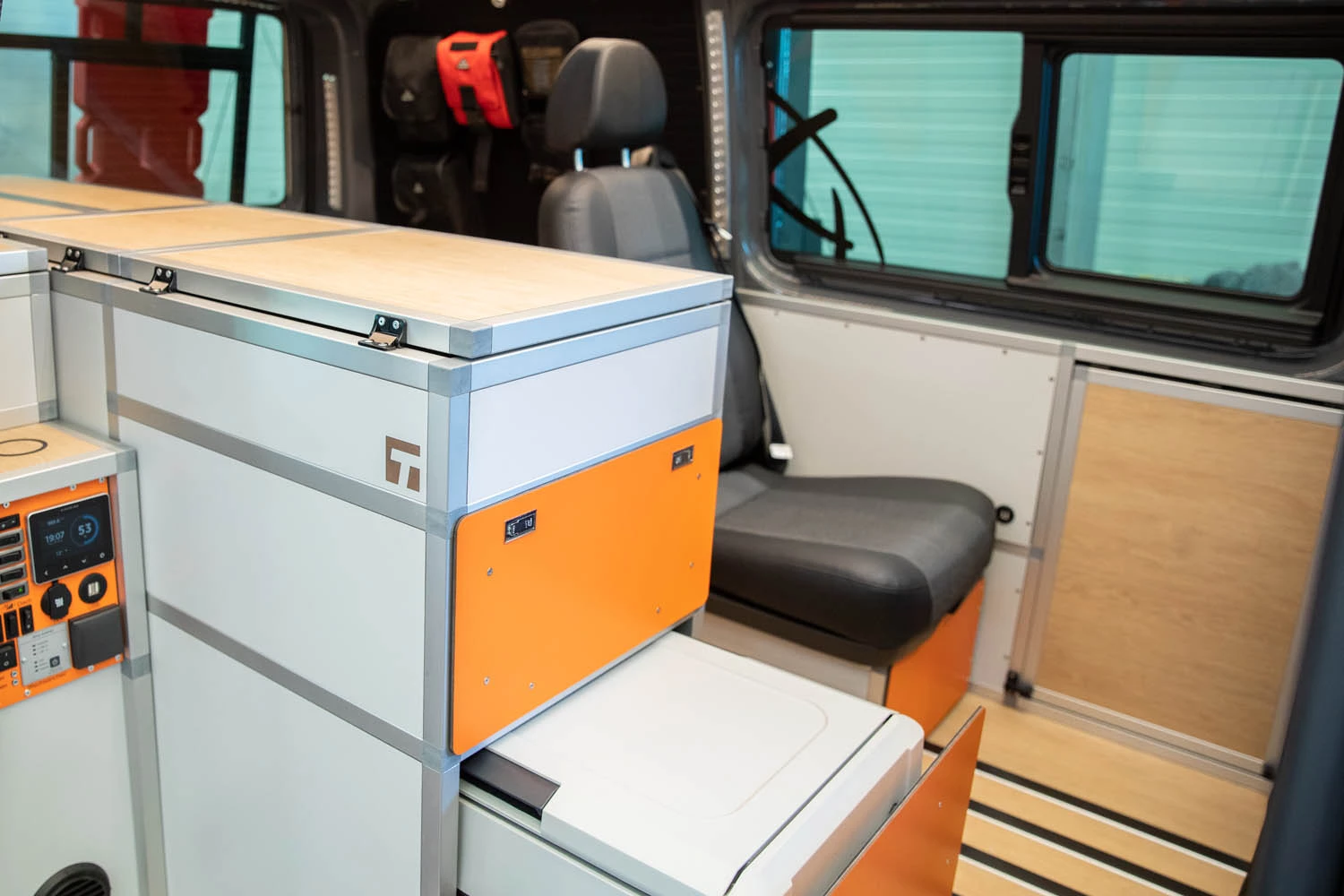 The revised floor rail system peeking out in this photo gives the new Terracamper Terock even more interior flexibility