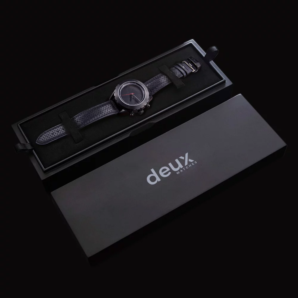 A Deux watch in its presentation case