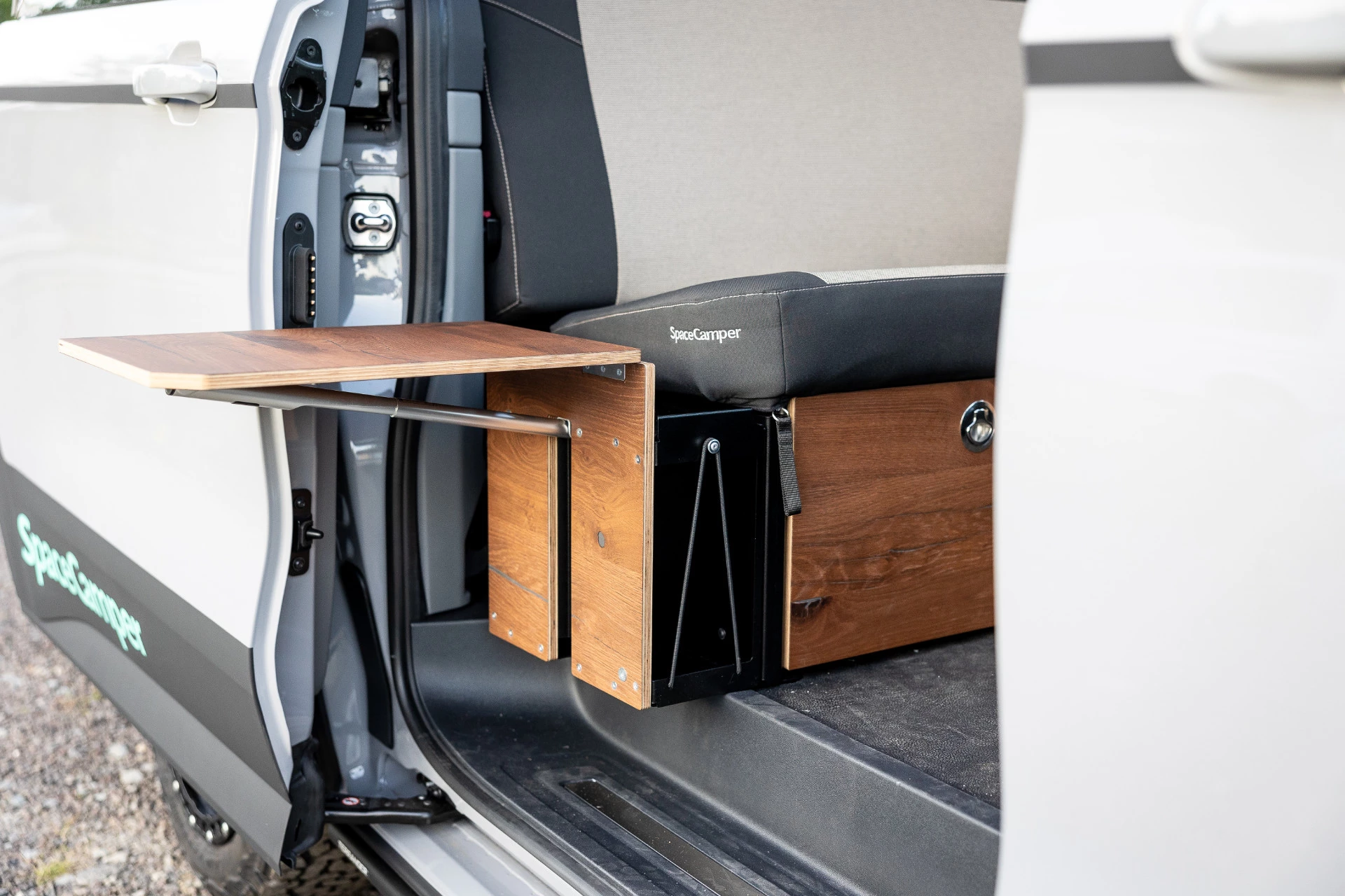 Passenger-side flip-up side table