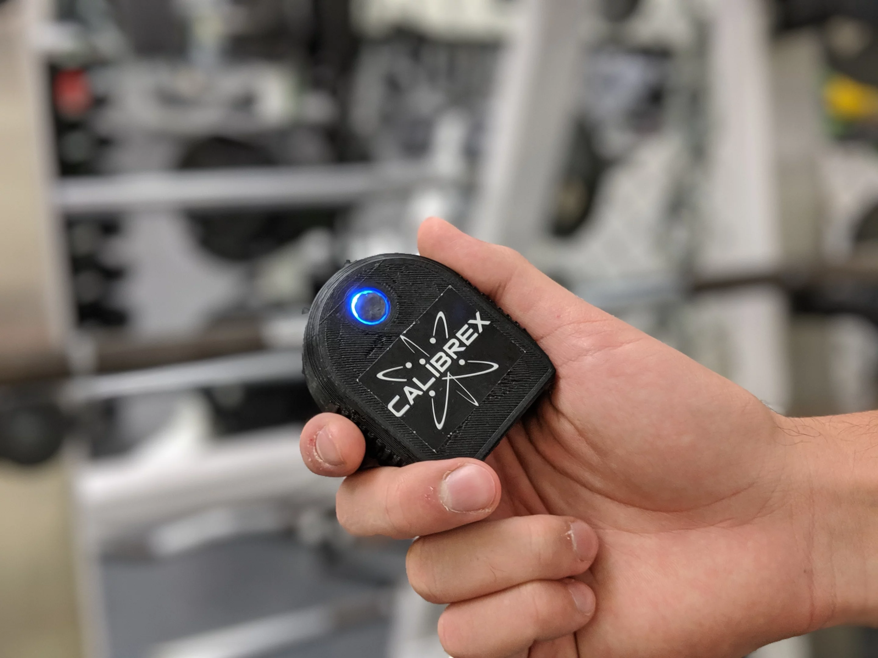 The Calibrex sensor units swivel relative to the barbell, so they remain facing down at all times