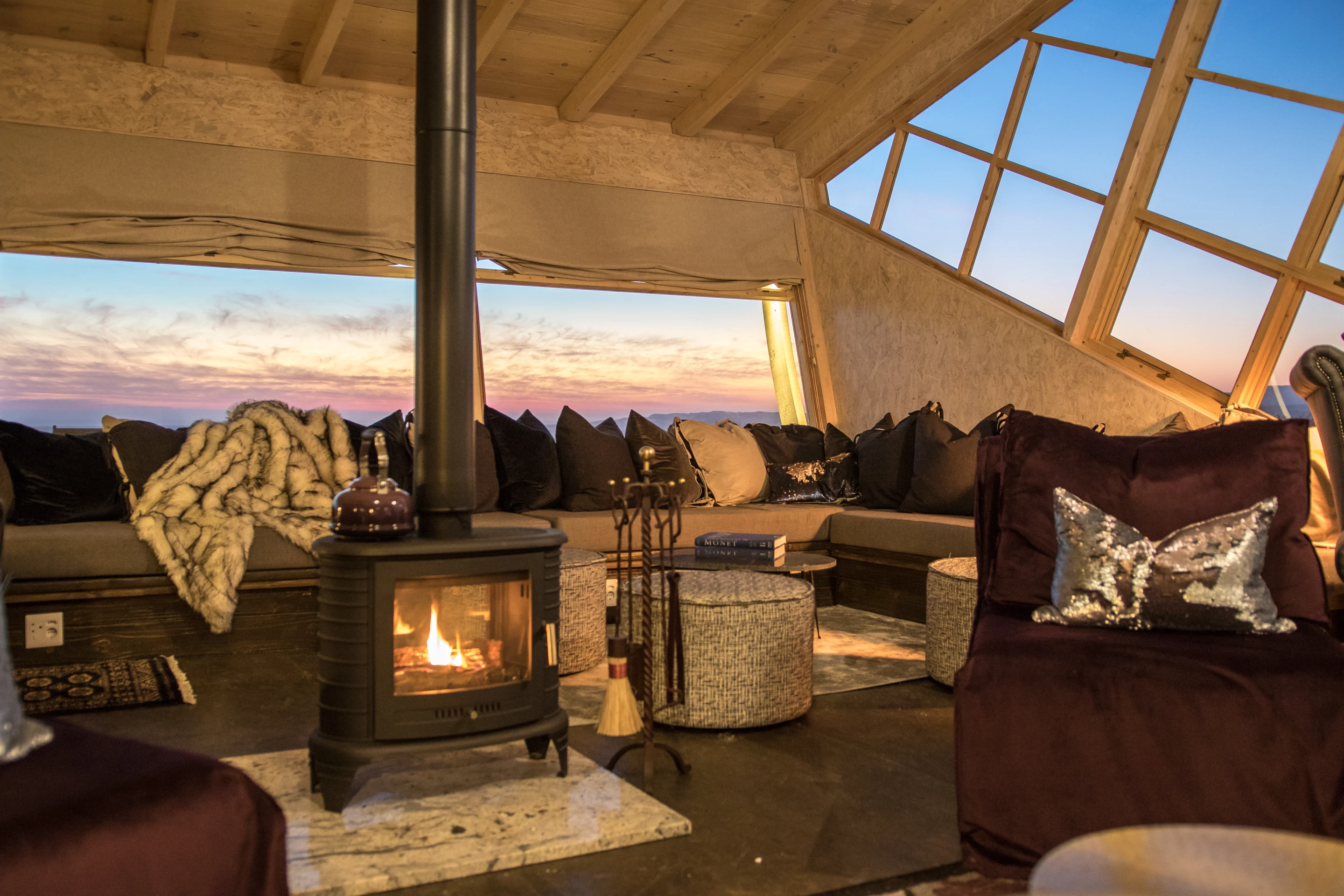 Inside the cabins at Namibia's Shipwreck Lodge, guests find a wood burner stove and an ensuite