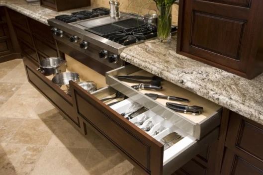 Drawers that open remotely or with the brush of a hand