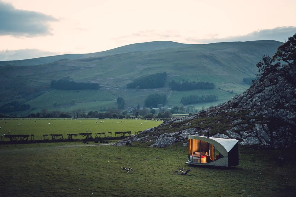Dragon'sEye is a 12.5 sq m (34.5 sq ft) tiny cabin built by Welsh architectCarwyn Jones