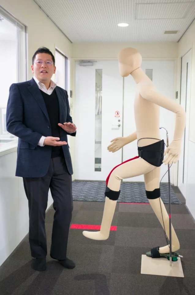 Associate Professor Yuichi Kurita with the Unplugged Powered Suit