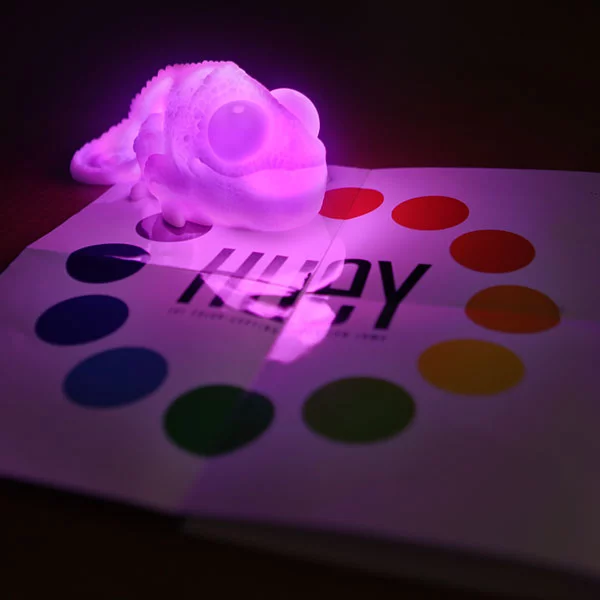 Huey the Color Copying Chameleon Lamp identifies any color that it's placed on, then glows in that color