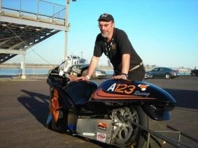 Owner Bill Dube with the Killacycle electric drag bike - before he crashed it into a van.