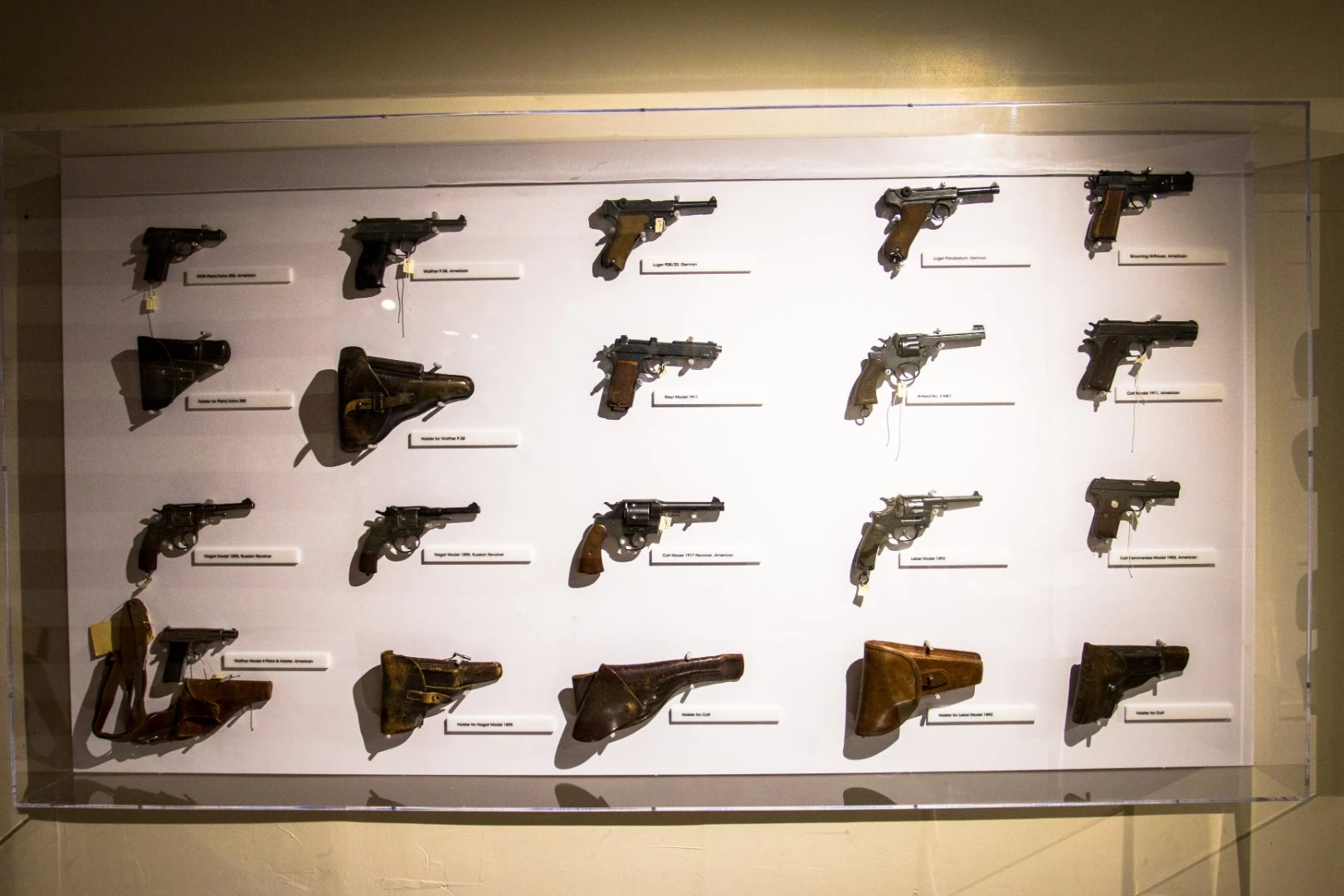 An impressive display of American and German handguns carried during World War II