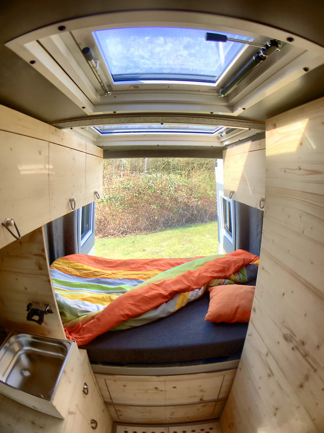 A look back at the raised rear bed of the Flowcamper Max