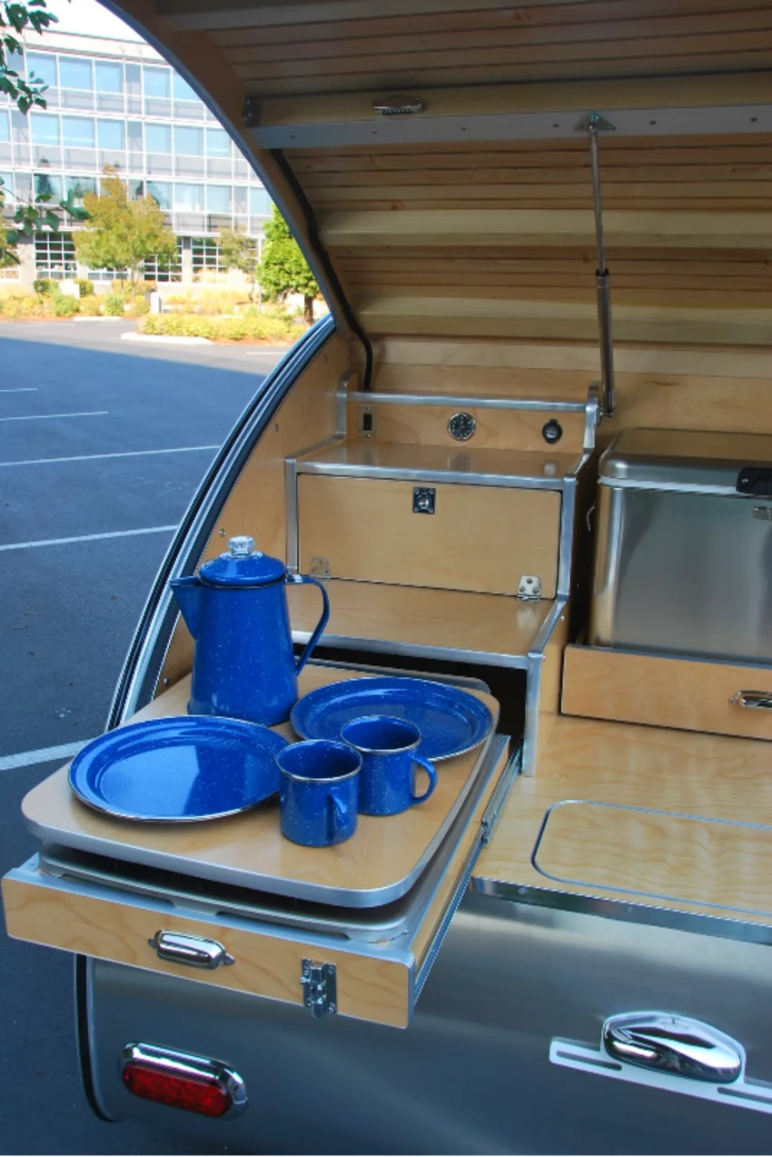 The wood cooktop lid provides counter space