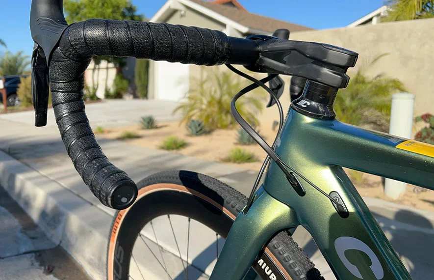 The original version of the Doormate replaces one of the bar-end plugs on a road bike's handlebars