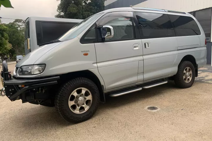 The 2003 Delica 4WD Crystal Lite Roof makes a compelling little all-terrain mini-camper van