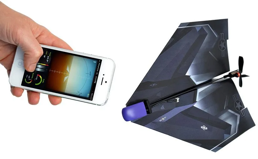 A paper airplane equipped with the PowerUp 3.0 kit, which is controlled via PowerUp's flight control app