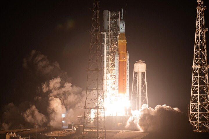 Carrying the uncrewed Orion spacecraft, the SLS lifts off from Launch Pad 39B at the Kennedy Space Center